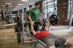 man bench pressing